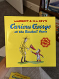 Curious George, at the baseball game